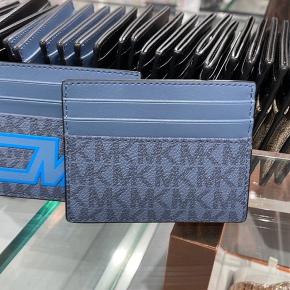 Michael Kors Cooper Graphic Logo Tall Card Case Denim Multi 36S3LCOD2B
NWT - Picture 6 of 16